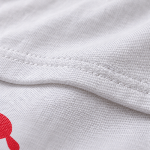 69 Interrupted white unisex graphic T-shirt — fabric and print close-up