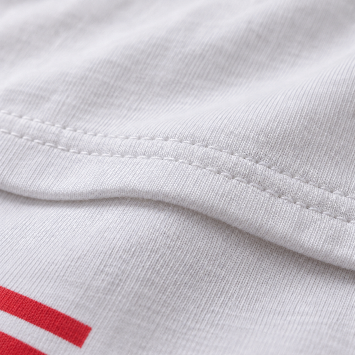 American Pie white unisex graphic T-shirt — fabric and print close-up