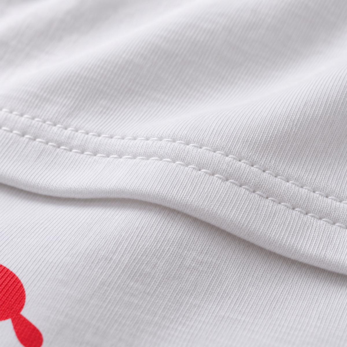 Qtip unisex graphic T-shirt — fabric closeup