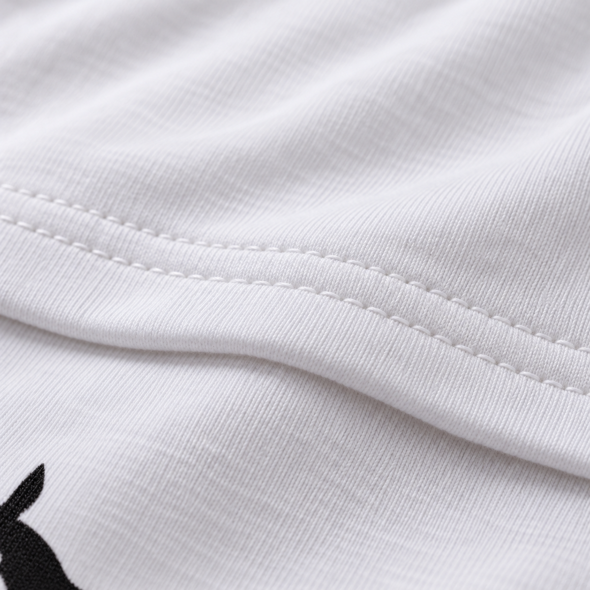 Smart Ass unisex graphic T-shirt — fabric closeup