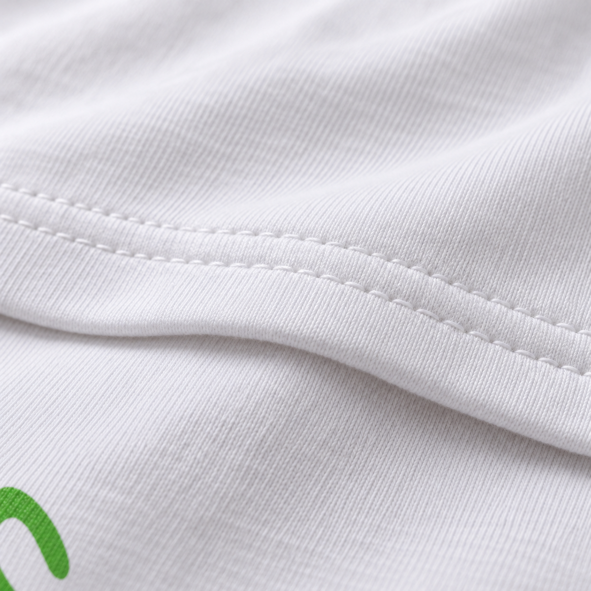 Up Yours unisex graphic T-shirt — fabric closeup