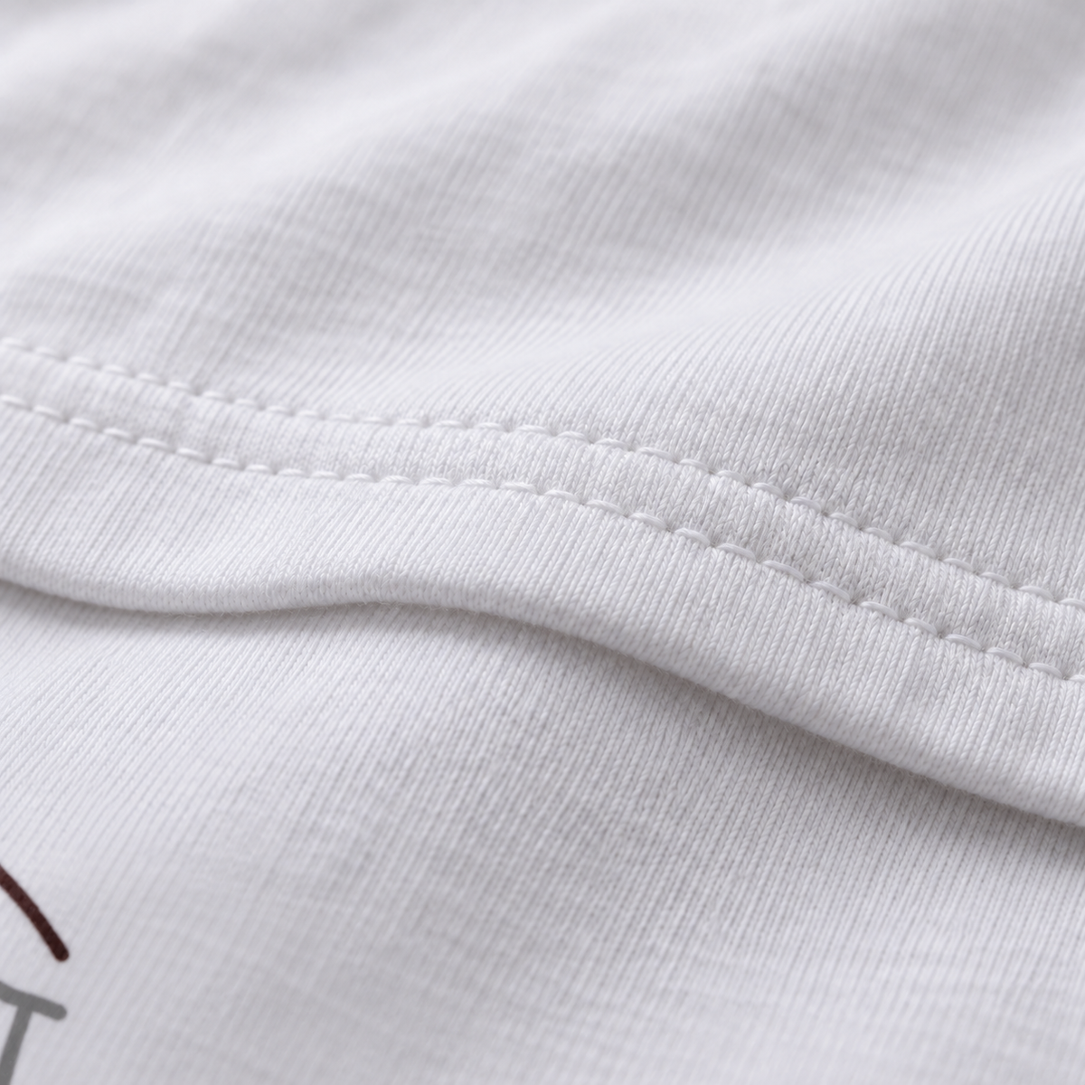 Big Idea white unisex graphic T-shirt — fabric and print close-up