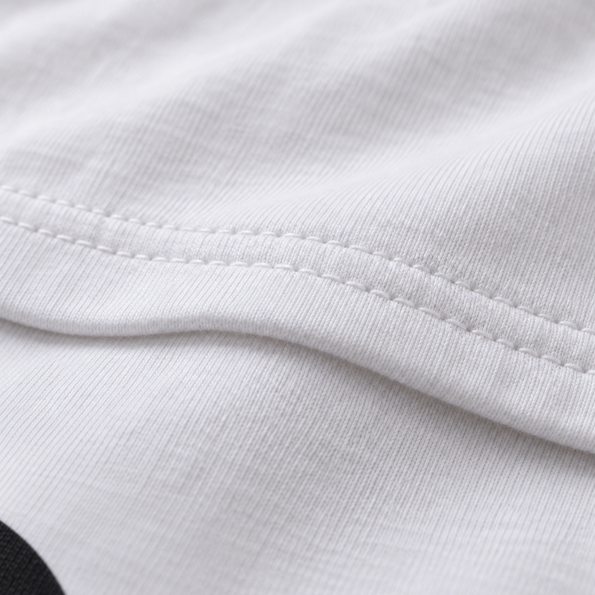Black Hole white unisex graphic T-shirt — fabric and print close-up