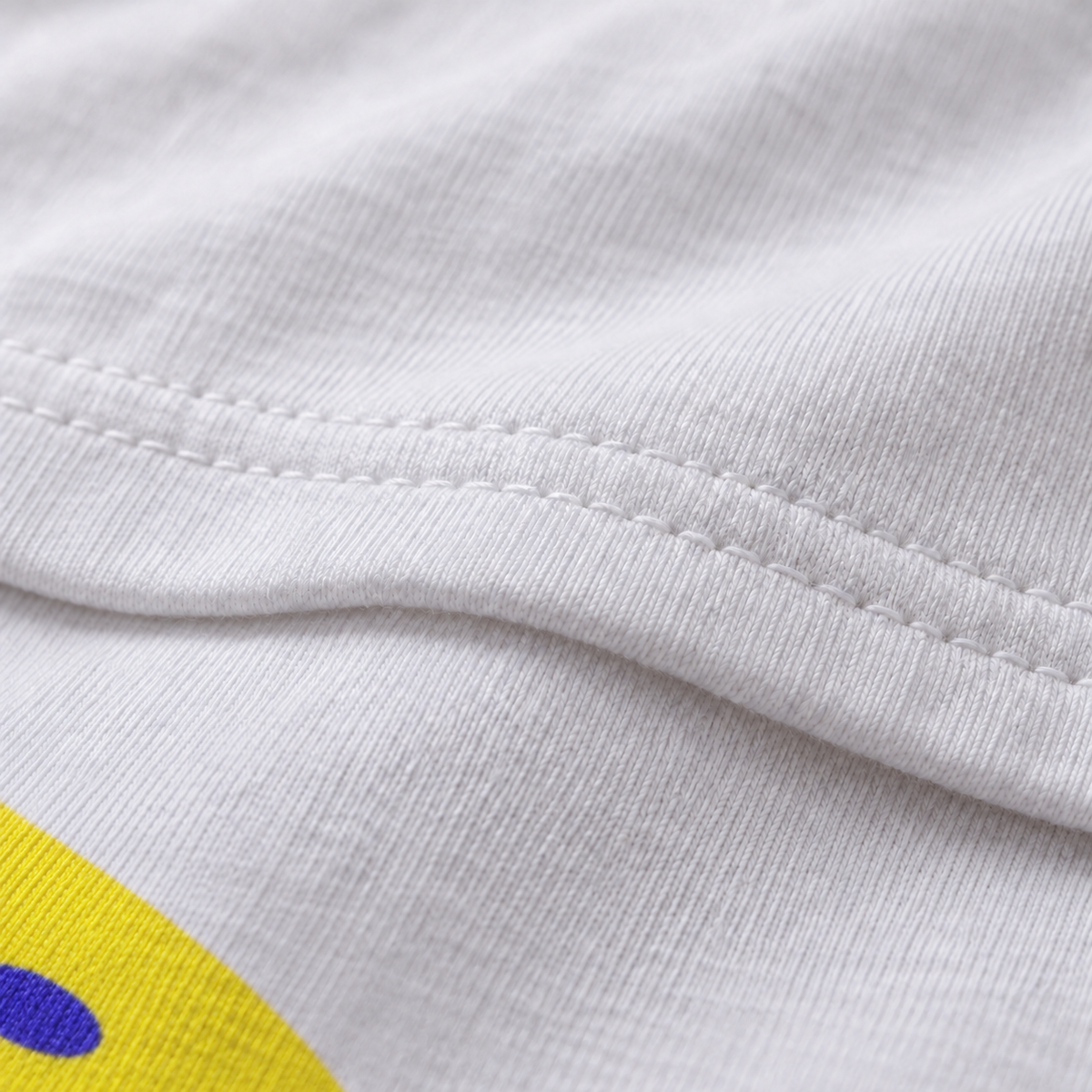 Booger Philosophy white unisex graphic T-shirt — fabric and print close-up