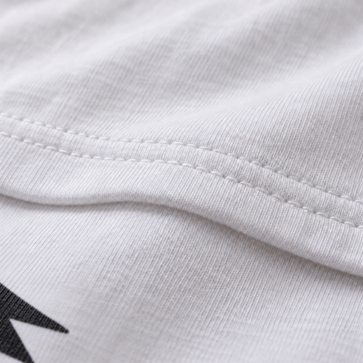 Brain Fart white unisex graphic T-shirt — fabric and print close-up