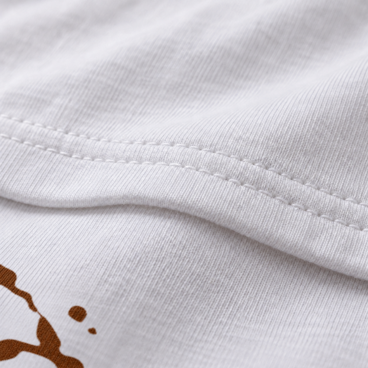 The Shit Hits the Fan white unisex graphic T-shirt — fabric and print close-up
