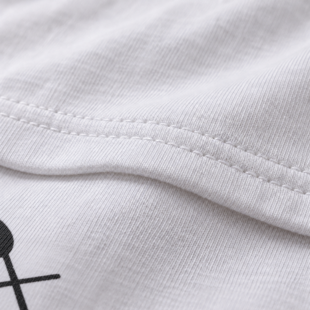 Cutting Out the Middle Man white unisex graphic T-shirt — fabric and print close-up