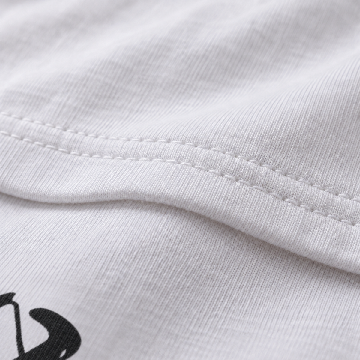 Death white unisex graphic T-shirt — fabric and print close-up