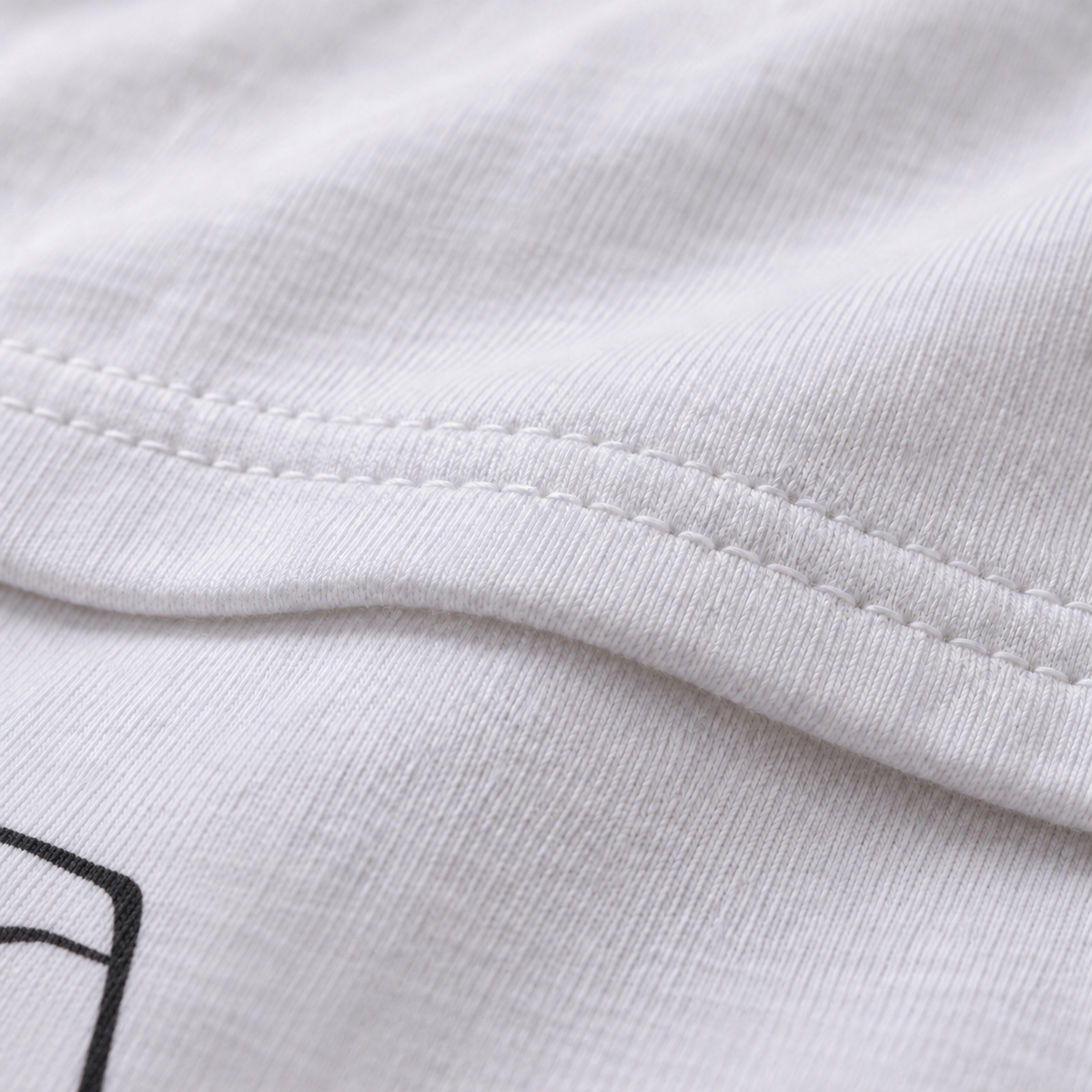 Get a Grip white unisex graphic T-shirt — fabric and print close-up