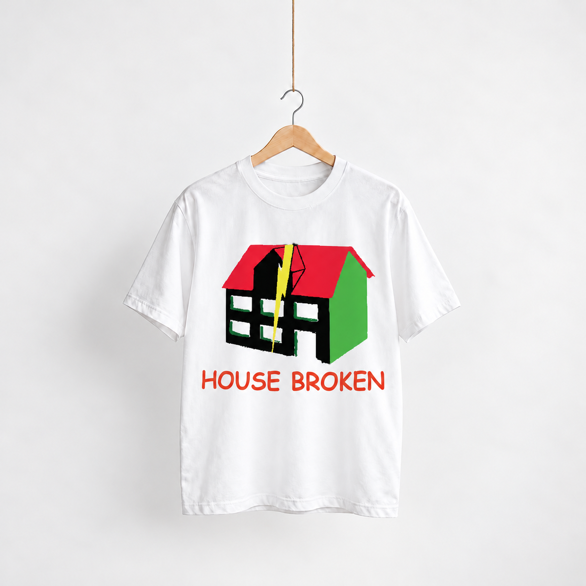 House Broken white unisex graphic T-shirt — front view on a hanger