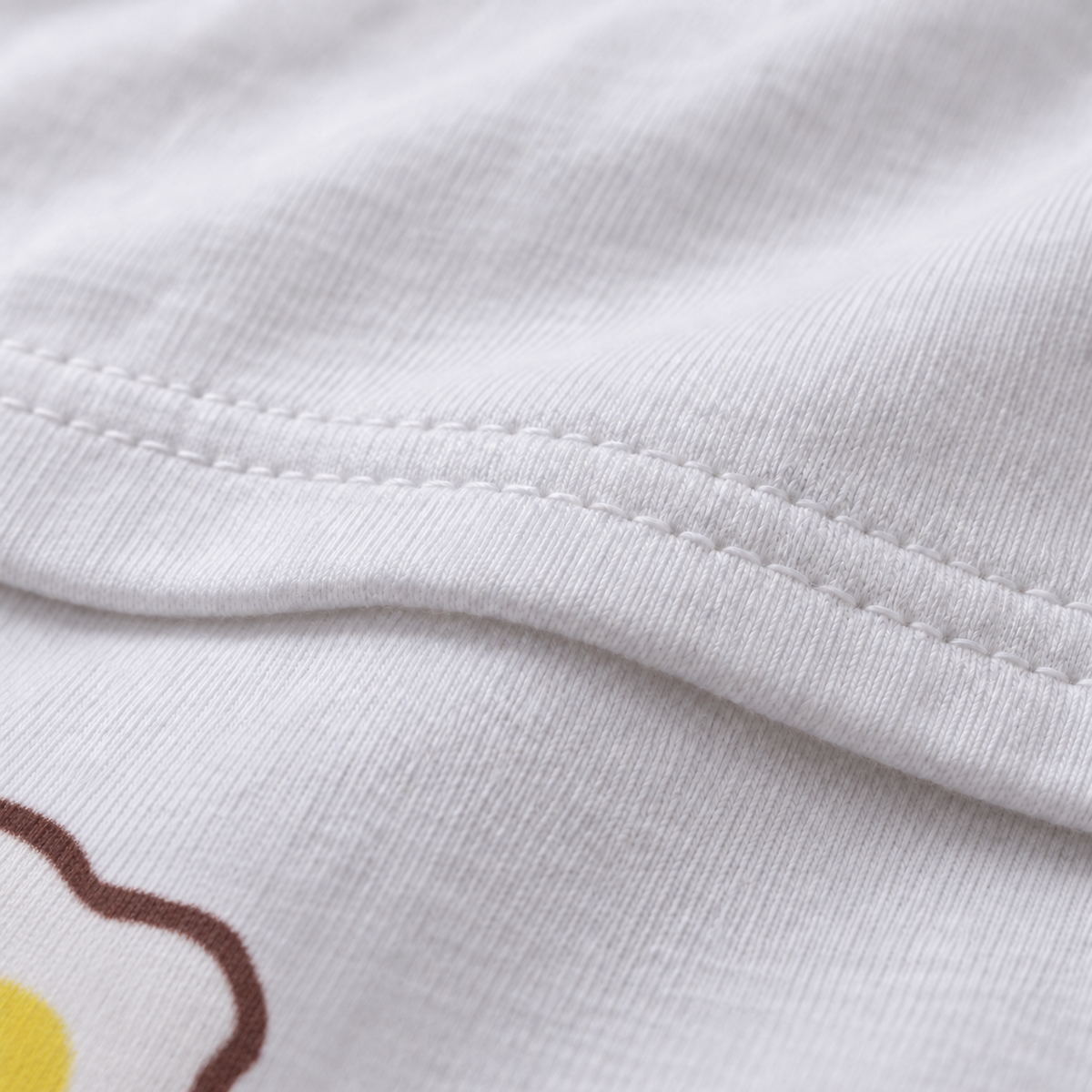 Just Got Laid white unisex graphic T-shirt — fabric and print close-up