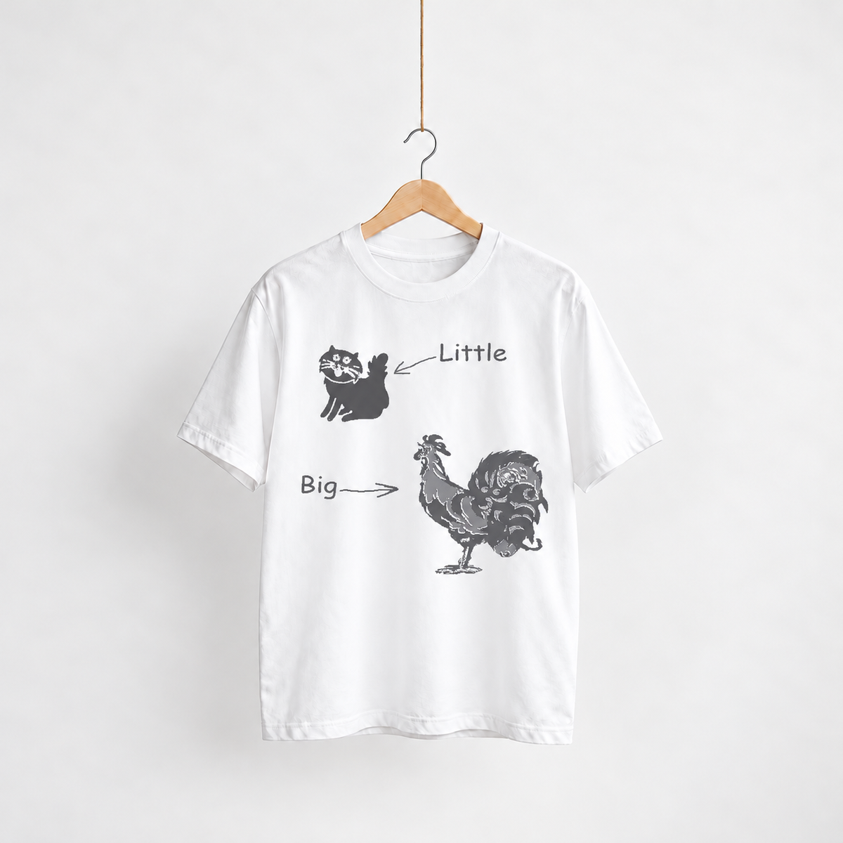 Little Pussy Big Cock white unisex graphic T-shirt — front view on a hanger